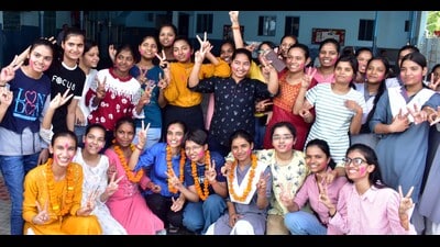 Prayagraj students celebrate their results on Friday. (HT Photo) Prayagraj students celebrate their results on Friday. (HT Photo)