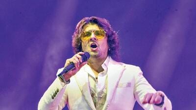 Singer-composer Sonu Nigam performing in front of live audience. Singer-composer Sonu Nigam performing in front of live audience.
