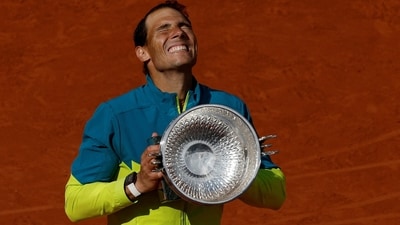 Spain's Rafael Nadal celebrates with trophy after winning the men's singles final against Norway's Casper Ruud (REUTERS)