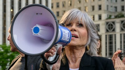 Actress/activist Jane Fonda and other climate activists demonstrate to end all fossil fuels in Central Park as President Joe Biden is in town for a campaign reception. (AFP) Actress/activist Jane Fonda and other climate activists demonstrate to end all fossil fuels in Central Park as President Joe Biden is in town for a campaign reception. (AFP)