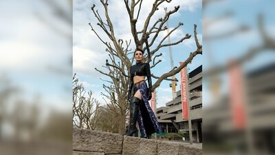 Radhika Madan wore an edgy black cut-out crop top featuring glove sleeves and a turtle neckline. (Instagram/@radhikamadan) Radhika Madan wore an edgy black cut-out crop top featuring glove sleeves and a turtle neckline. (Instagram/@radhikamadan)