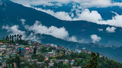 Darjeeling is a picturesque hill station in West Bengal, known for its tea gardens and stunning views of the Himalayas. You and your mother can take a ride on the Darjeeling Himalayan Railway, also known as the Toy Train, and explore the tea gardens. You can also visit the Buddhist monasteries and enjoy a cup of Darjeeling tea together. (Unsplash) Darjeeling is a picturesque hill station in West Bengal, known for its tea gardens and stunning views of the Himalayas. You and your mother can take a ride on the Darjeeling Himalayan Railway, also known as the Toy Train, and explore the tea gardens. You can also visit the Buddhist monasteries and enjoy a cup of Darjeeling tea together. (Unsplash)
