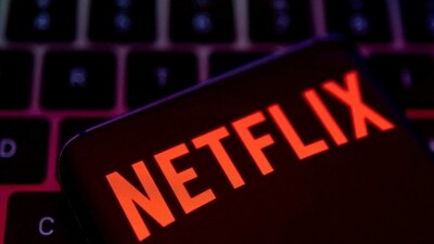 Smartphone with Netflix logo is placed on a keyboard. (REUTERS)