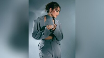 Sonakshi's hair was styled by hairstylist Madhuri Nakhale, who opted for a messy bun with elegant flicks framing her face, resulting in a chic and stylish look. (Instagram/@aslisona ) Sonakshi's hair was styled by hairstylist Madhuri Nakhale, who opted for a messy bun with elegant flicks framing her face, resulting in a chic and stylish look. (Instagram/@aslisona )