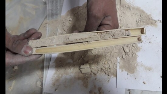 In the consignment of 4000 pieces of brooms in 40 bags, the heroin was stealthily filled in 442 hollow short sticks. (HT Photo)
