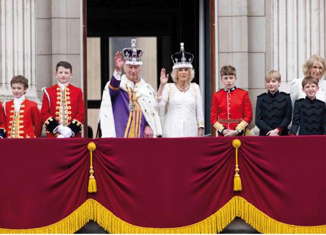 It was refreshing to see a blended family on the balcony of Buckingham House, as Camilla’s grandchildren walked on to stand beside her and the King. (Reuters) It was refreshing to see a blended family on the balcony of Buckingham House, as Camilla’s grandchildren walked on to stand beside her and the King. (Reuters)