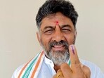 Karnataka Congress chief DK Shivakumar shows his ink-marked finger after casting his vote for the assembly election in Kanakapura Taluk. (ANI Photo)(Source: DK Shivakumar Twitter)