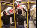 Indians dance in London metro. 