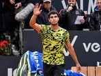 Carlos Alcaraz of Spain waves after winning his match against Albert Ramos-Vinolas of Spain at the Italian Open Carlos Alcaraz of Spain waves after winning his match against Albert Ramos-Vinolas of Spain at the Italian Open
