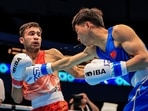 India's Deepak Bhoria (red) 