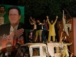 Supporters of former Prime Minister Imran Khan greet their leader upon is arrival at his home in Lahore, Pakistan, early Saturday, May 13, 2023. Supporters of former Prime Minister Imran Khan greet their leader upon is arrival at his home in Lahore, Pakistan, early Saturday, May 13, 2023.
