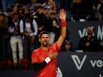 Serbia's Novak Djokovic celebrates after winning his round of 64 match against Argentina's Tomas Martin Etcheverry