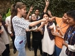 Students celebrating after CBSE Board class 12th results declared at Baldwin Academy in Patna.