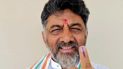 Karnataka Congress chief DK Shivakumar shows his ink-marked finger after casting his vote for the assembly election in Kanakapura Taluk. (ANI Photo) (Source: DK Shivakumar Twitter)
