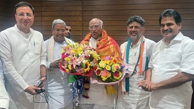 Congress national president Mallikarjun Kharge being felicitated by party leaders DK Shivakumar, Siddaramaiah, KC Venugopal and Randeep Surjewala on the party's victory in the Karnataka assembly elections on Saturday. (Mallikarjun Kharge Twitter) Congress national president Mallikarjun Kharge being felicitated by party leaders DK Shivakumar, Siddaramaiah, KC Venugopal and Randeep Surjewala on the party's victory in the Karnataka assembly elections on Saturday. (Mallikarjun Kharge Twitter)