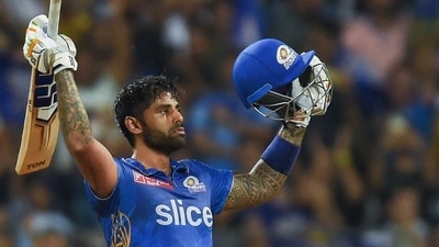 Mumbai Indians' Suryakumar Yadav celebrates after scoring a century (100 runs) during the Indian Premier League (IPL) Twenty20 cricket match between Mumbai Indians and Gujarat Titans at the Wankhede Stadium in Mumbai on May 12, 2023. (Photo by Punit PARANJPE / AFP) (AFP) Mumbai Indians' Suryakumar Yadav celebrates after scoring a century (100 runs) during the Indian Premier League (IPL) Twenty20 cricket match between Mumbai Indians and Gujarat Titans at the Wankhede Stadium in Mumbai on May 12, 2023. (Photo by Punit PARANJPE / AFP) (AFP)