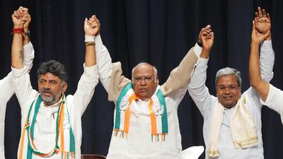 Congress leaders celebrate after the win in Bengaluru on Saturday. (PTI) Congress leaders celebrate after the win in Bengaluru on Saturday. (PTI)