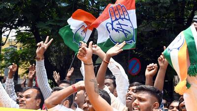 Congress supporters celebrate the party’s good show in Karnataka Assembly polls (ANI) Congress supporters celebrate the party’s good show in Karnataka Assembly polls (ANI)