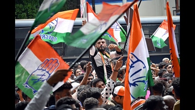 Congress supporters celebrate the party's victory in the Karnataka assembly elections, in Bengaluru on Saturday. (ANI) Congress supporters celebrate the party's victory in the Karnataka assembly elections, in Bengaluru on Saturday. (ANI)