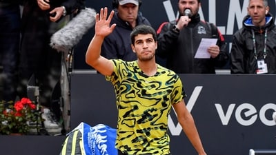 Carlos Alcaraz of Spain waves after winning his match against Albert Ramos-Vinolas of Spain at the Italian Open (AP) Carlos Alcaraz of Spain waves after winning his match against Albert Ramos-Vinolas of Spain at the Italian Open (AP)