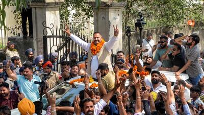 Jalandhar: Newly elected AAP MP Sushil Kumar Rinku greets supporters as he celebrates his win the Jalandhar seat by-election, in Jalandhar, Saturday, May 13, 2023. (PTI Photo) (PTI05_13_2023_000183B) (PTI)