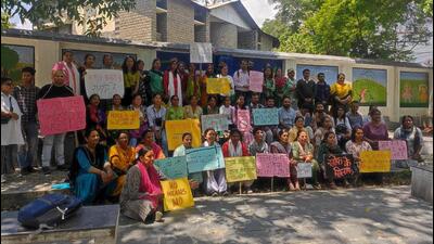 Members of various women organisations and civil societies during their protest in Dharamshala on Saturday. (HT photo)