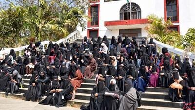 Muslim students wearing burqas and hijabs protest outside the Shivamogga district collector’s office on February 17, 2022. (HT file) Muslim students wearing burqas and hijabs protest outside the Shivamogga district collector’s office on February 17, 2022. (HT file)