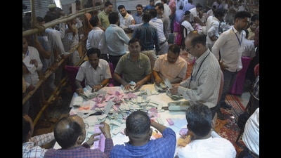 Officials counting votes from ballot paper at Ghaziabad Govindpuram Anaj Mandi in Ghaziabad , India on Saturday. (Sakib Ali/HT Photo) Officials counting votes from ballot paper at Ghaziabad Govindpuram Anaj Mandi in Ghaziabad , India on Saturday. (Sakib Ali/HT Photo)