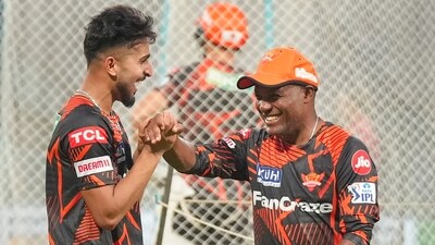Sunrisers Hyderabad coach Brian Lara with Umran Malik during a practice session (PTI) Sunrisers Hyderabad coach Brian Lara with Umran Malik during a practice session (PTI)