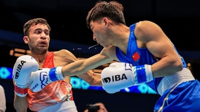 India's Deepak Bhoria (red) (PTI) India's Deepak Bhoria (red) (PTI)