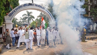 Congress leaders and supporters celebrate with crackers the party's decisive lead in the Karnataka Assembly polls, at the party office in Patna. (PTI) Congress leaders and supporters celebrate with crackers the party's decisive lead in the Karnataka Assembly polls, at the party office in Patna. (PTI)