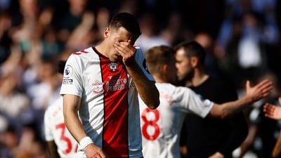 Southampton's Jan Bednarek looks dejected after losing the match and being relegated from the Premier League (Action Images via Reuters)