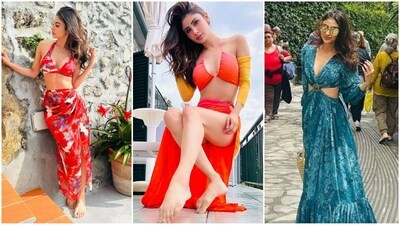 Mouni Roy is not just an accomplished actress, but also a fashion icon, who has been setting new style trends with her impeccable fashion sense. Recently, the diva has been on a vacation and her holiday fashion looks have been making waves on the internet. From flaunting a stunning blue cut-out dress to rocking chic bikini tops, Mouni is giving major fashion goals to her fans, who can't seem to get enough of her stylish holiday looks. (Instagram/@imouniroy) Mouni Roy is not just an accomplished actress, but also a fashion icon, who has been setting new style trends with her impeccable fashion sense. Recently, the diva has been on a vacation and her holiday fashion looks have been making waves on the internet. From flaunting a stunning blue cut-out dress to rocking chic bikini tops, Mouni is giving major fashion goals to her fans, who can't seem to get enough of her stylish holiday looks. (Instagram/@imouniroy)