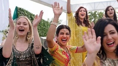 Parineeti Chopra was an excited bridesmaid during Priyanka Chopra's wedding celebrations. Here, she is seen in a yellow outfit, cheering with Priyanka, Sofie Turner during the Haldi. Parineeti Chopra was an excited bridesmaid during Priyanka Chopra's wedding celebrations. Here, she is seen in a yellow outfit, cheering with Priyanka, Sofie Turner during the Haldi. 