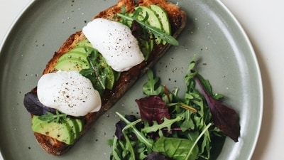 Avocado Toast: Toast slices of whole-grain bread and spread mashed avocado on top. Sprinkle with salt, pepper, and your choice of toppings, such as sliced cherry tomatoes, feta cheese, or microgreens. (Pexels) Avocado Toast: Toast slices of whole-grain bread and spread mashed avocado on top. Sprinkle with salt, pepper, and your choice of toppings, such as sliced cherry tomatoes, feta cheese, or microgreens. (Pexels)
