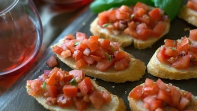 Bruschetta: Toast baguette slices and top them with a mixture of diced tomatoes, fresh basil, garlic, olive oil, and a pinch of salt. It's a classic summer snack bursting with flavours. (Pexels) Bruschetta: Toast baguette slices and top them with a mixture of diced tomatoes, fresh basil, garlic, olive oil, and a pinch of salt. It's a classic summer snack bursting with flavours. (Pexels)