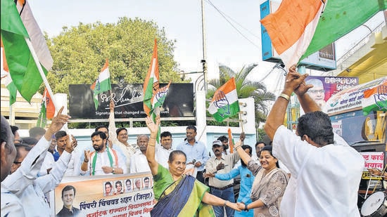 Members of Pimpri Chinchwad City District Congress Committee celebrate the victory of the national party in Karnataka on Saturday. (HT PHOTO)