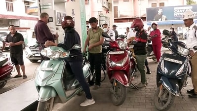 People stand in a queue at a petrol pump in the aftermath of Manipur violence, in Imphal on Friday. (ANI) People stand in a queue at a petrol pump in the aftermath of Manipur violence, in Imphal on Friday. (ANI)