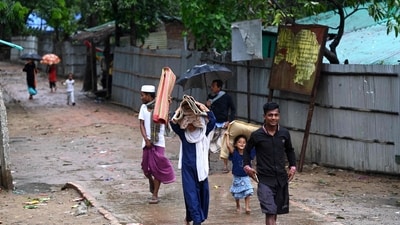 Thousands fled Myanmar's west coast and officials in neighbouring Bangladesh raced to evacuate Rohingya refugees on May 13 as the most powerful cyclone in the region for over a decade churned across the Bay of Bengal. (AFP)
