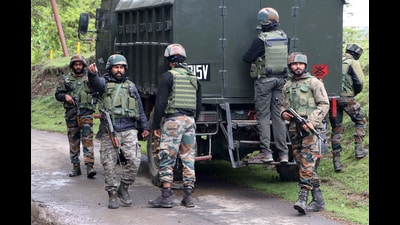 Security personnel patrol the area where an encounter broke out between security forces and terrorists at Andwan Sagam, in Anantnag on Sunday. (ANI PHOTO) Security personnel patrol the area where an encounter broke out between security forces and terrorists at Andwan Sagam, in Anantnag on Sunday. (ANI PHOTO)