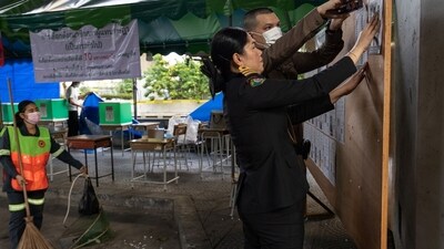 Thailand Elections: Election officials prepare the information board at a polling station in the Phaya Thai area of Bangkok, Thailand. (Bloomberg) Thailand Elections: Election officials prepare the information board at a polling station in the Phaya Thai area of Bangkok, Thailand. (Bloomberg)