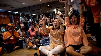 Supporters of the Move Forward Party react as they watch results come in at the party headquarters in Bangkok after polls closed in Thailand's general election. (AFP) Supporters of the Move Forward Party react as they watch results come in at the party headquarters in Bangkok after polls closed in Thailand's general election. (AFP)