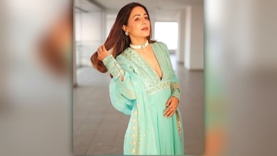 Hina Khan's luscious hair was styled with a middle parting and left open, cascading down her back in a stunning display of elegance. (Instagram/@realhinakhan) Hina Khan's luscious hair was styled with a middle parting and left open, cascading down her back in a stunning display of elegance. (Instagram/@realhinakhan)