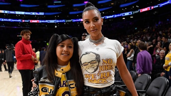 Kim Kardashian and daughter North West attend the Western Conference Semifinal Playoff game between the Los Angeles Lakers and Golden State Warriors at Crypto.com Arena. (Getty Images via AFP)