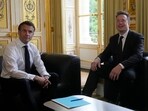 Tesla CEO Elon Musk, right, poses with French President Emmanuel Macron prior to their talks. Tesla CEO Elon Musk, right, poses with French President Emmanuel Macron prior to their talks.