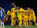 Barcelona players celebrate after the Spanish La Liga soccer match between Espanyol and Barcelona Barcelona players celebrate after the Spanish La Liga soccer match between Espanyol and Barcelona