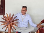 Ambassador of United States to India Eric Garcetti spins the charkha during his visit to the Sabarmati Gandhi Ashram.