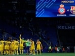 Barca players celebrate after the Spanish La Liga match between Espanyol and Barcelona