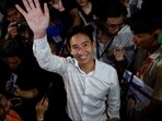 Move Forward Party leader and prime ministerial candidate, Pita Limjaroenrat, waves to the crowd during the general election in Bangkok, Thailand.
