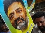 Supporters of senior Congress leader DK Shivakumar outside the venue of the Congress Legislature Party (CLP) meeting in Bengaluru on Sunday. (PTI)